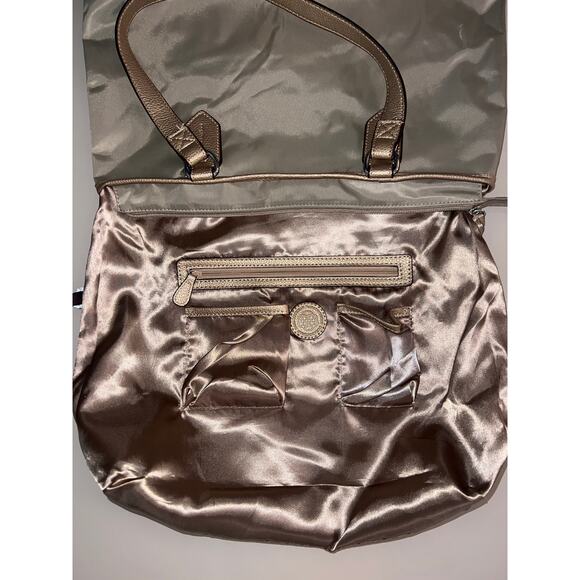 Dana Buchman handbag, 100% nylon fabric with pebbled  Dana Buchman handbag, 100% nylon fabric with pebbled metallic handle & trim.